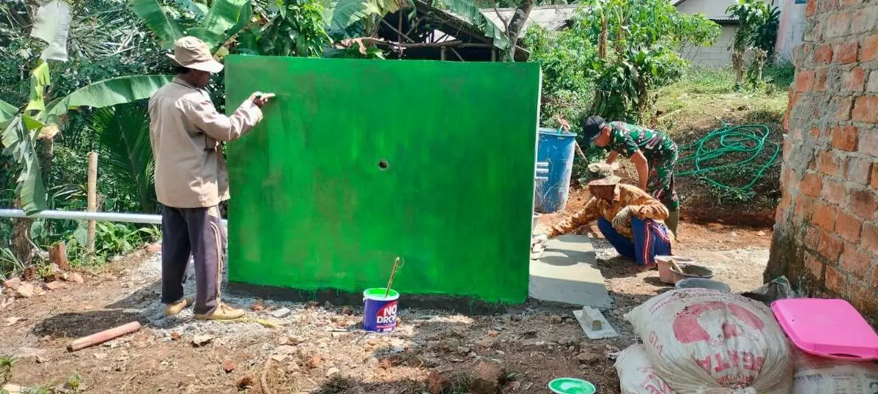 Satgas TMMD KE-125 Lanjutkan Pembangunan Bak Air di Kp. Cimanggu 2